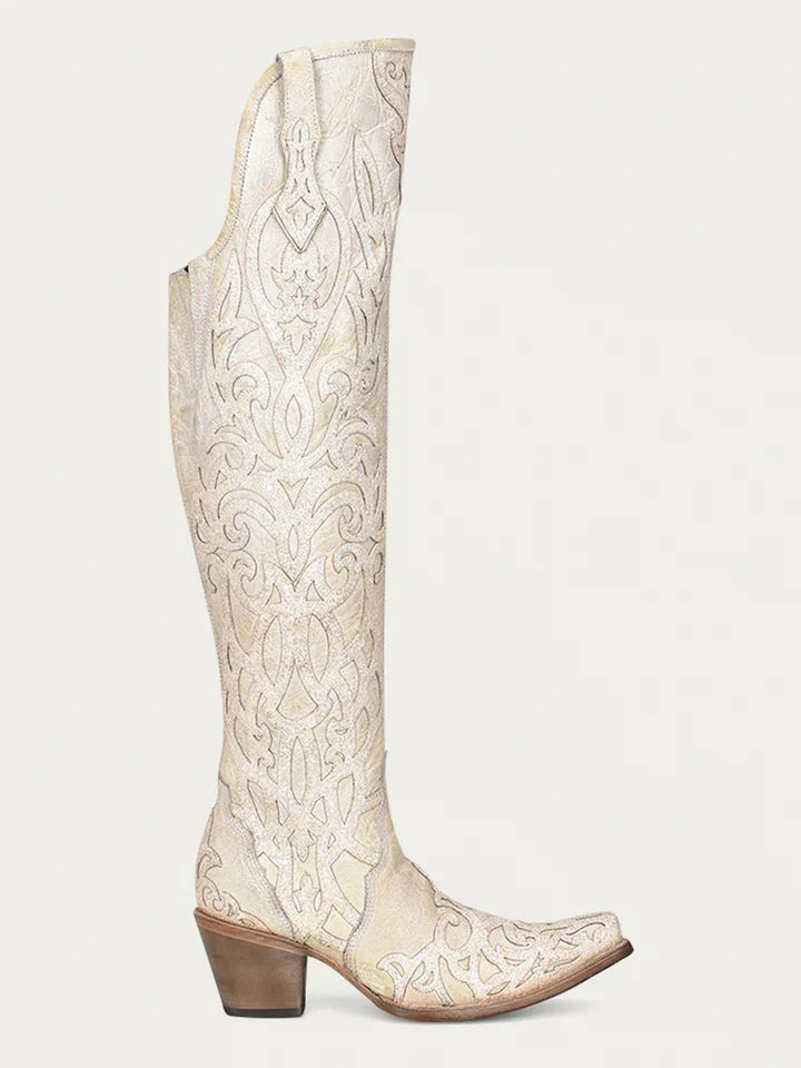 Beige boots with glitter overlay embroidery in a 22-inch shaft height with zipper on inside of shaft