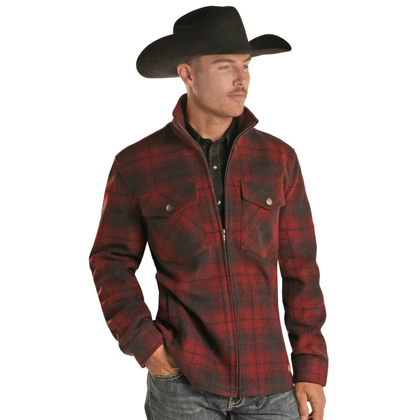MAN WEARING RED PLAID WOOL COAT WITH DOUBLE BREAST POCKETS AND ZIP UP FRONT