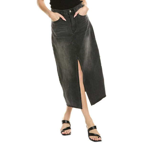 Person wearing a black denim skirt with a white background