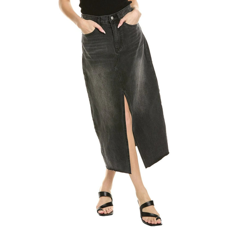 Person wearing a black denim skirt with a white background