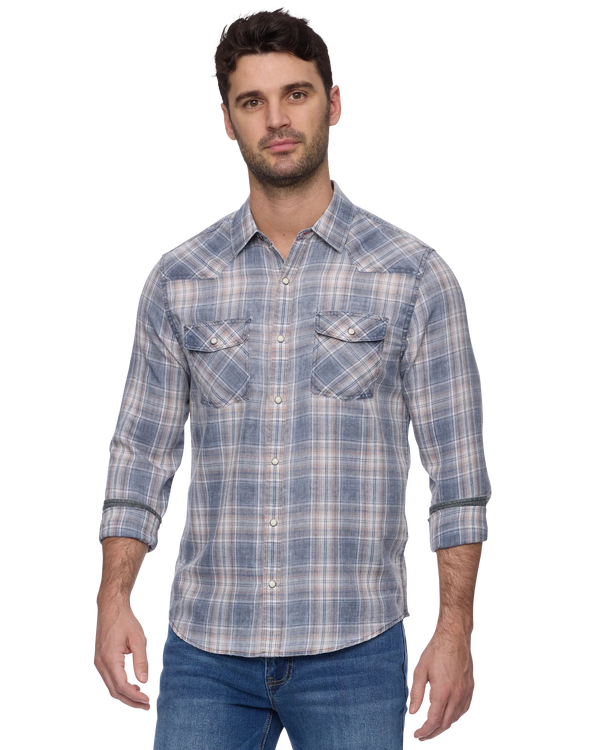 Man wearing a blue plaid shirt on a white background