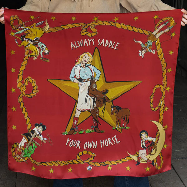 Woman wearing red scarf with rope boarder detail, cowgirls and stars with "always saddle your own horse" 