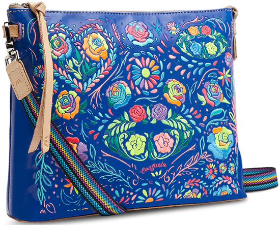 Blue crossbody bag with rainbow floral embroidery all over the front with rainbow strap