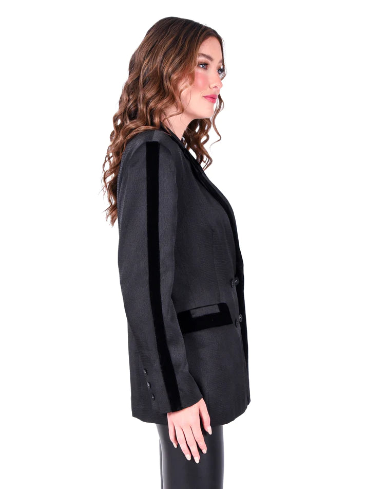 Black oversized double-breasted silhouette blazer, notched lapels and fabric covered buttons and velvet accent stripes.