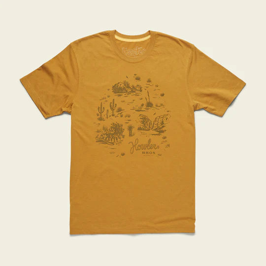 Short sleeve yellow graphic tee with scene of the desert with Howler Bros logo on the front