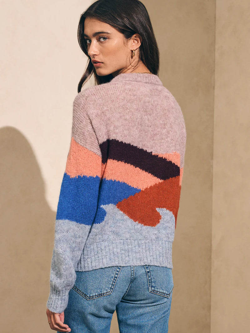 Woman wearing colorful sweater
