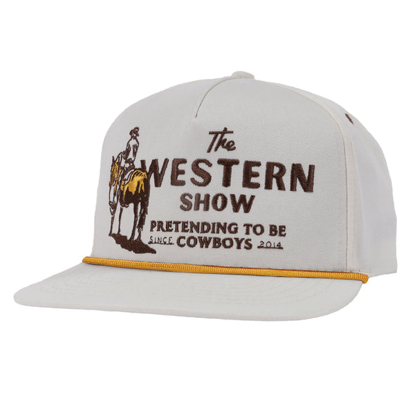 White trucker hat with cowboy on horse with script "The Western Show Pretending To Be Cowboy Since 2014"