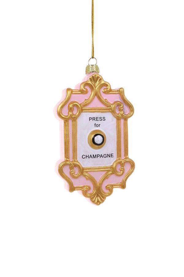 Pink doorbell ornament with script "Press for Champagne" on front