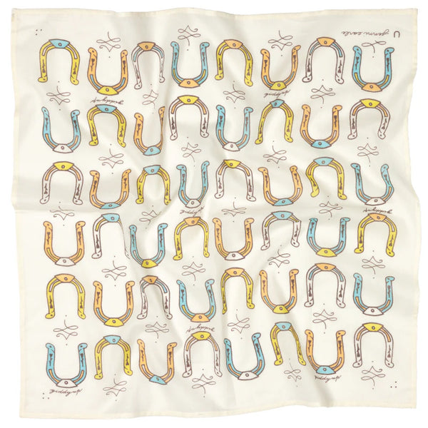 Patterned fabric with horseshoe design on a white background