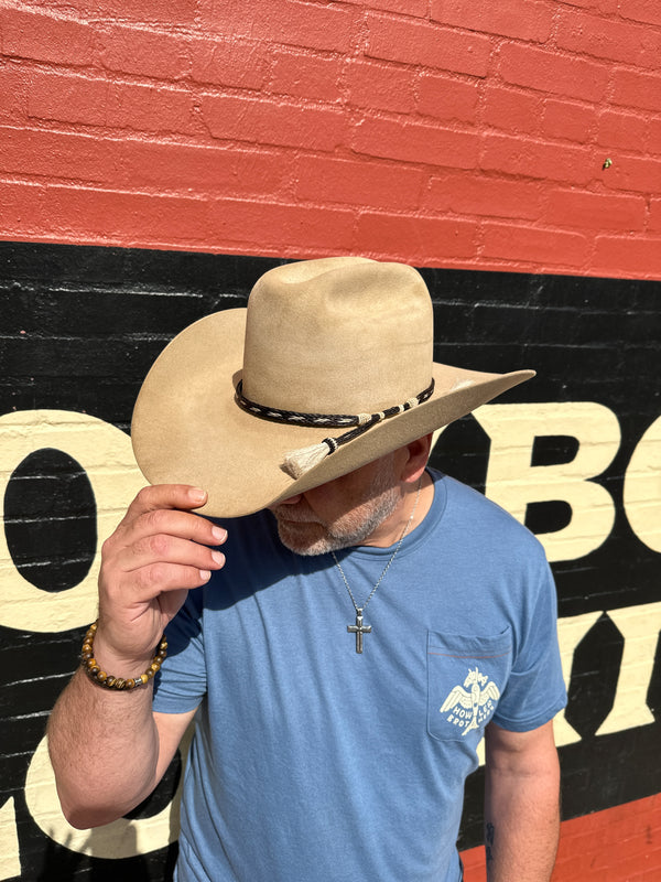 A model wearing Greeley Hat Works Yellowstone John Dutton Ranch Ready Cowboy Hat