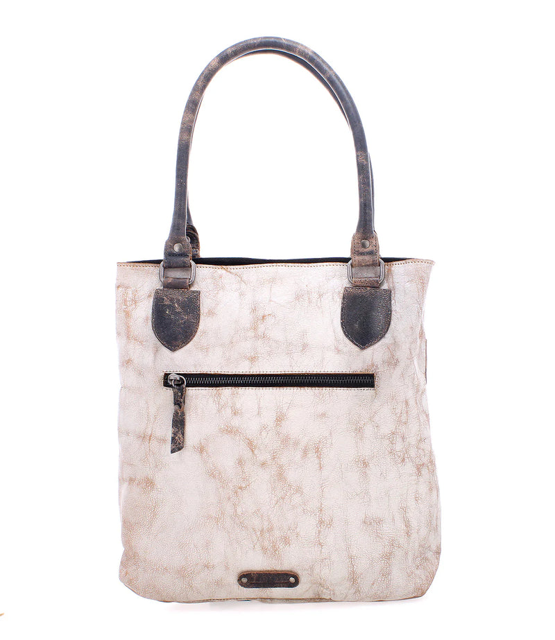White distressed leather handbag with black accents on a white background