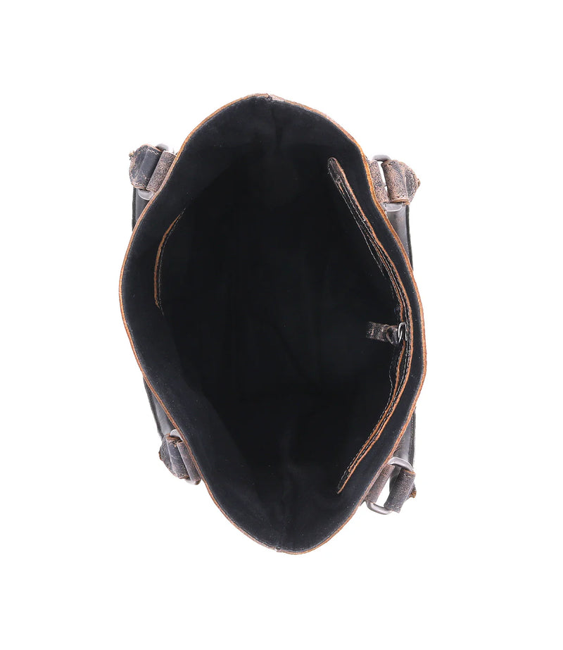 Black leather bag with visible stitching on a white background