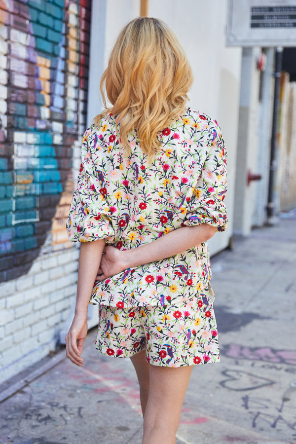 Woman wearing floral embroidery short