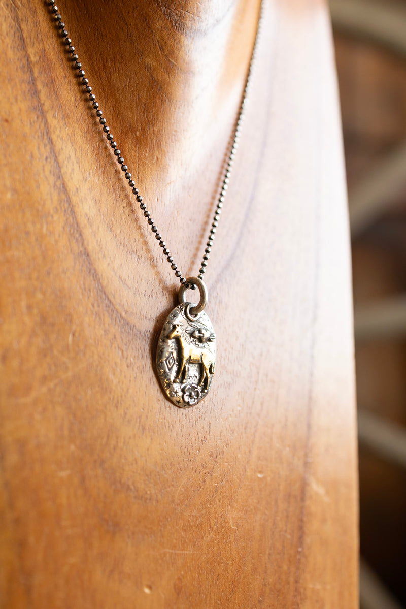 MARGARET SULLIVAN TINY BRASS HORSE ON OVAL NECKLACE