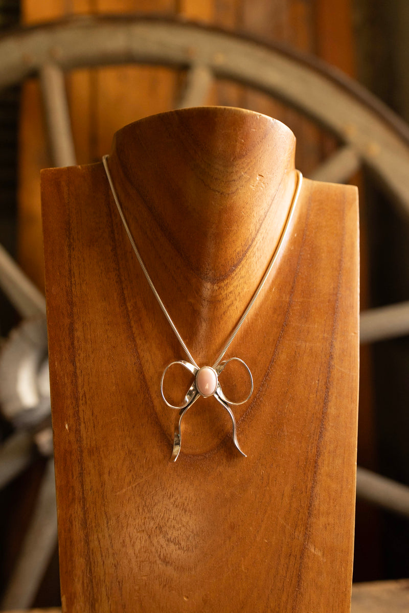 The Winged Heart Bow Queen Conch and Sterling Silver Necklace 