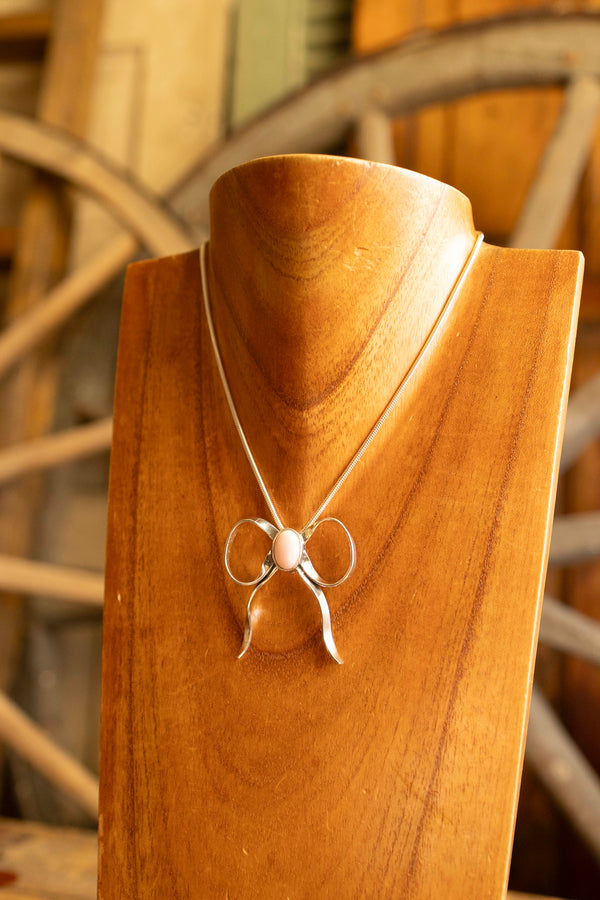 The Winged Heart Bow Queen Conch and Sterling Silver Necklace 