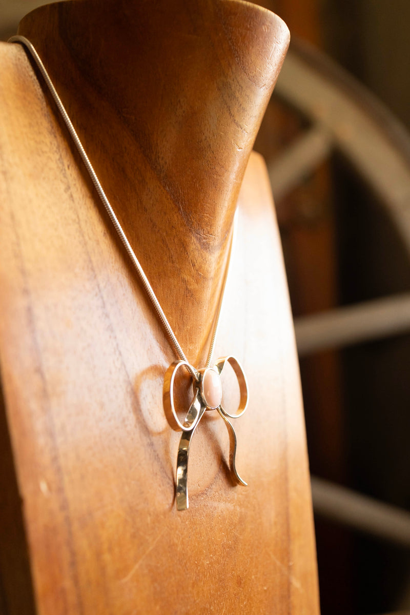 The Winged Heart Bow Queen Conch and Sterling Silver Necklace 