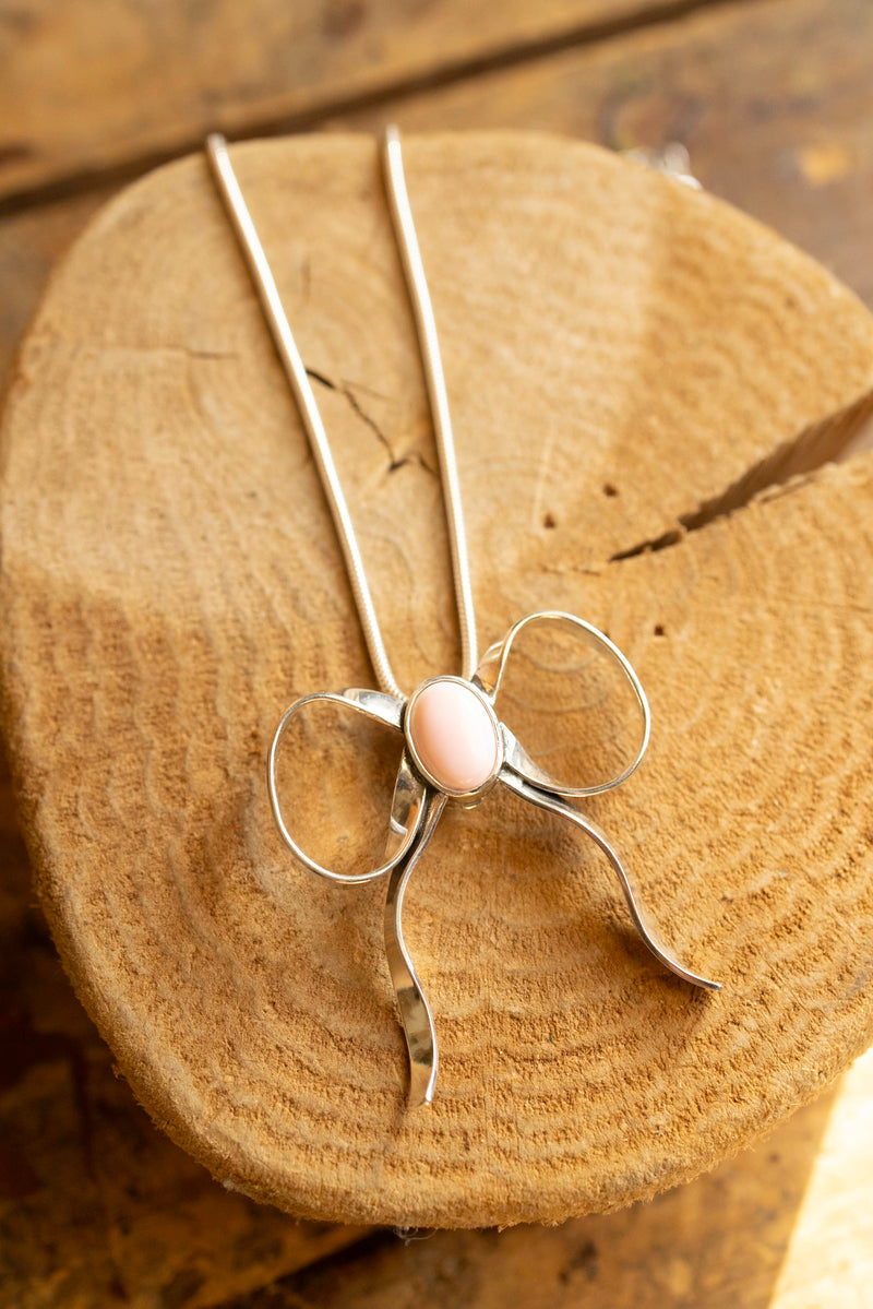 The Winged Heart Bow Queen Conch and Sterling Silver Necklace 