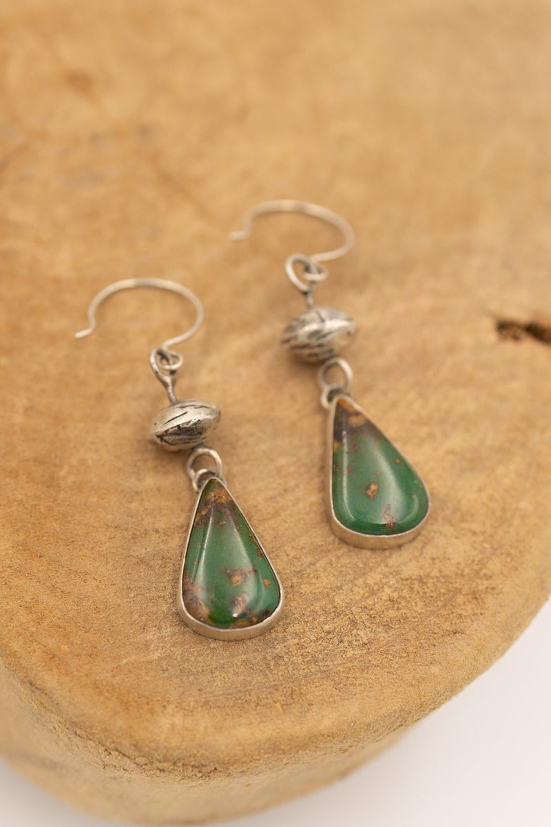 Beautiful turquoise accompanied by a sterling silver bead earring.