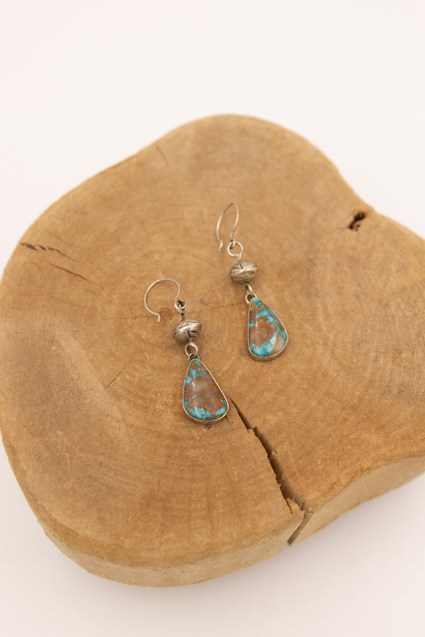 Beautiful turquoise accompanied by a sterling silver bead earring.