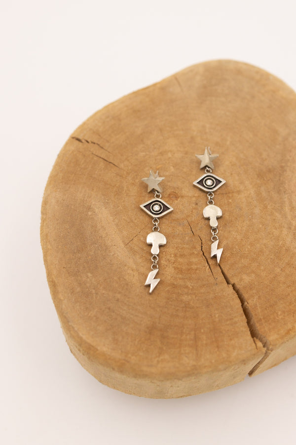 Sterling silver earrings with star, eye, mushroom and lightning symbol. The eye symbol has a cubic zirconia in the center