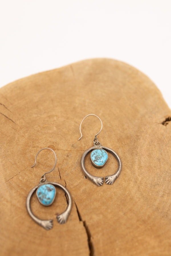 Sterling silver Naja earrings with turquoise center