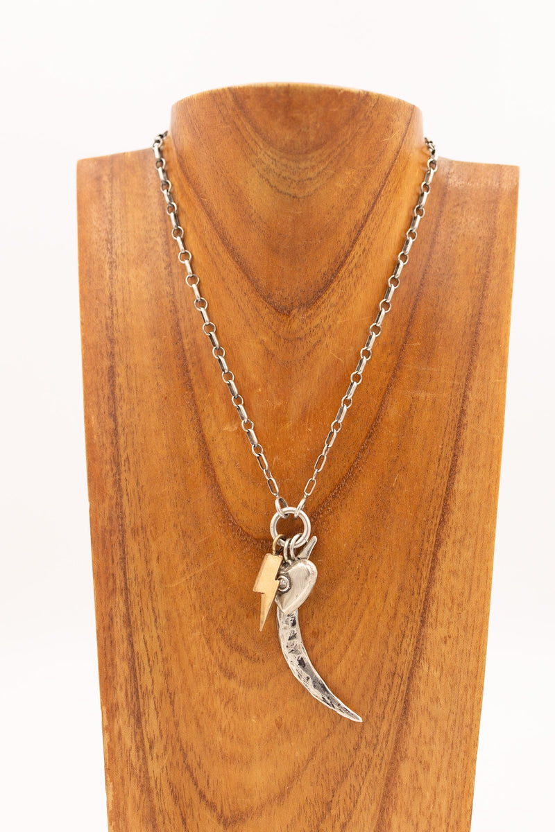 Bronze lightning bolt charm with display necklace and other charms