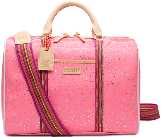 Topped with natural leather handles and an adjustable webbing strap, the Jetsetter is crafted to hold its shape and makes traveling easy with ample interior storage and functional pockets. The exterior is a shiny pink with silver metallic star sparkles all over
