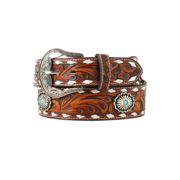 Women's belt with tapered strap has a tan floral tooled body. White buck laced edges with antique silver oval conchos that have a turquoise stone in the center.