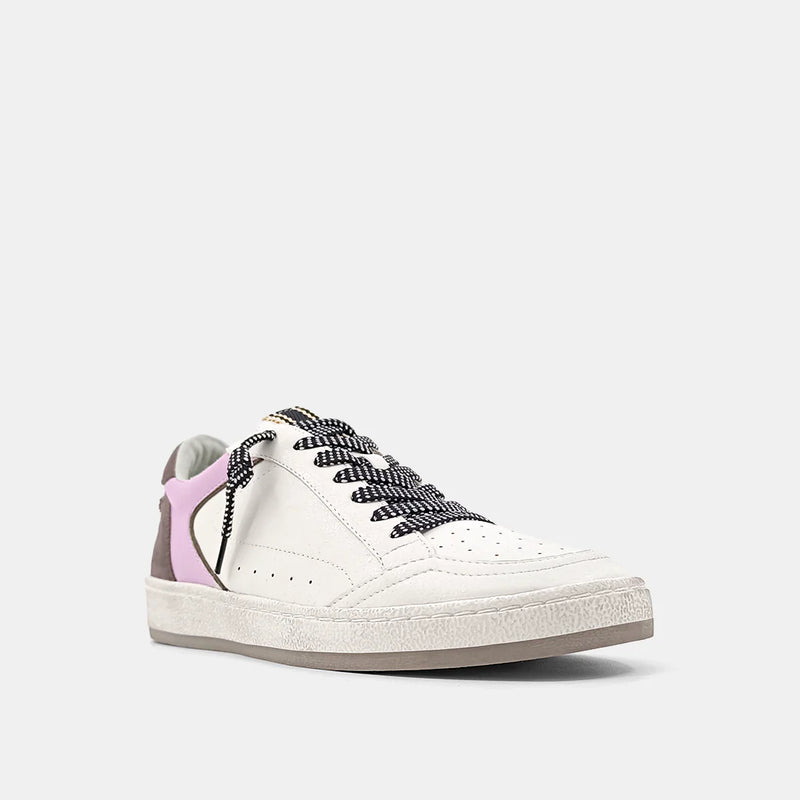 White, purple and brown sneaker with hair on hide star on the back