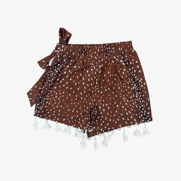Brown shorts with white pattern and tassels on a white background