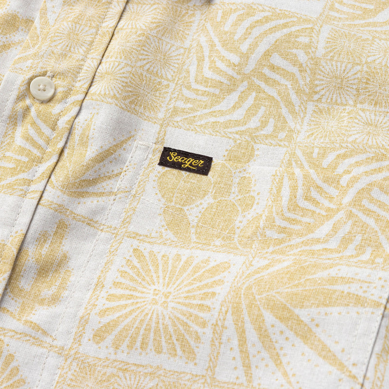 Short sleeve 3/4 button down men's shirt with hawiian feel to the design in cream and gold colorway