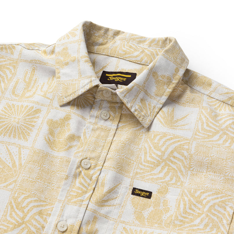 Short sleeve 3/4 button down men's shirt with hawiian feel to the design in cream and gold colorway