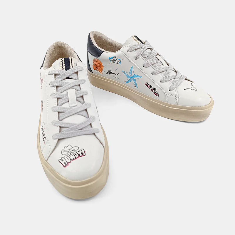 White sneaker with Texas symbols and sayings throughout