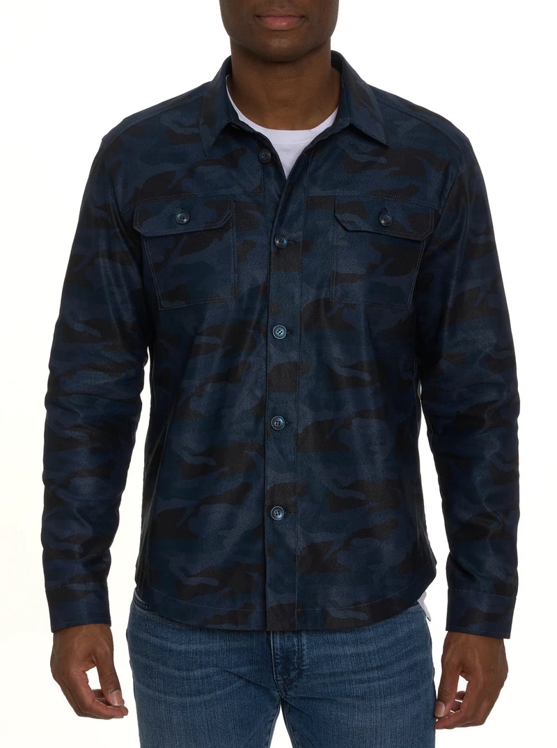 Man wearing blue and black camo shirt jacket with button front and double breast pockets