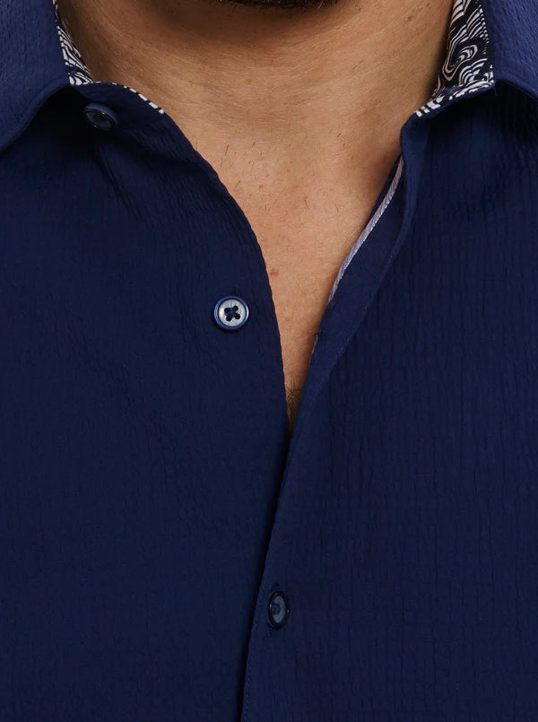 Man wearing navy button down shirt