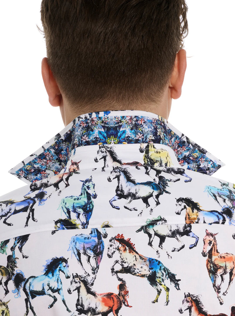 MAN WEARING LONG SLEEVE BUTTON UP SHIRT WITH MULTICOLOR HORSES ALL OVER