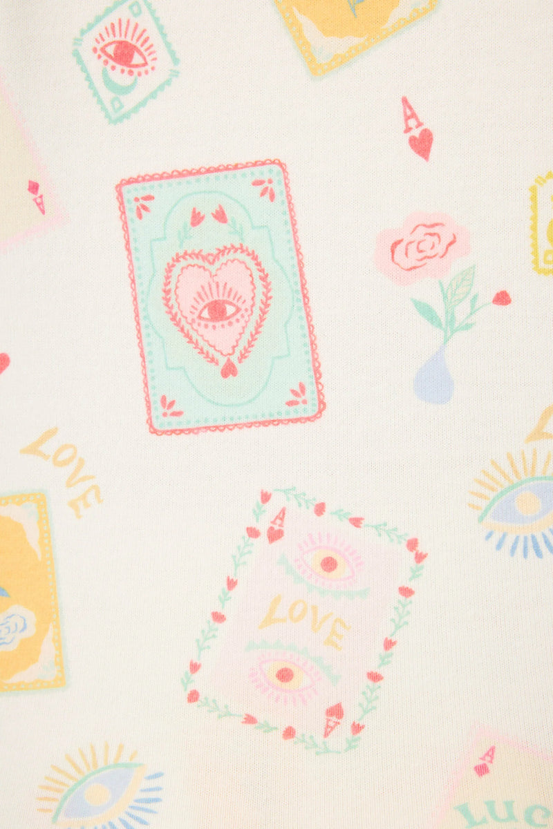 Pattern of tarot cards and symbols on a light background