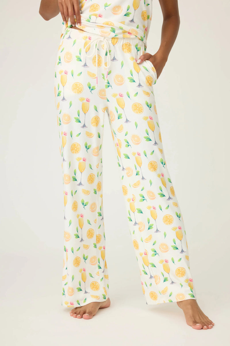 Pajama pants with lemon pattern on a white background