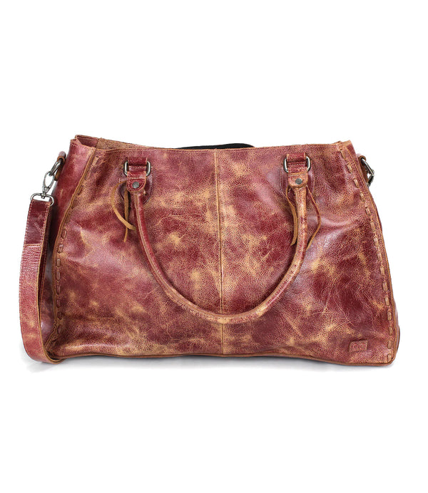 Brown leather tote bag on a white background