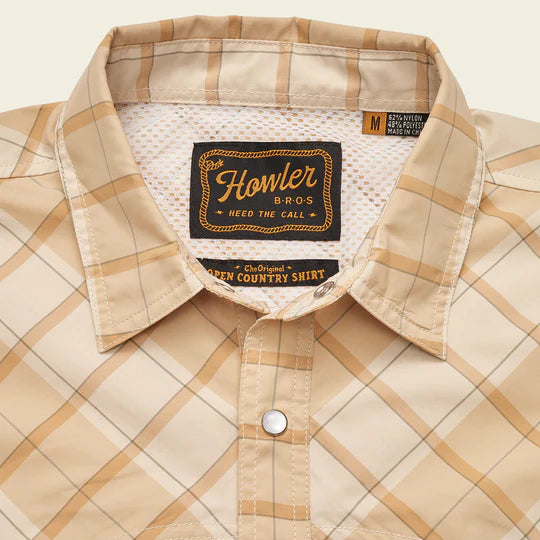 Short sleeve button up shirt with orange plaid and double breast vents
