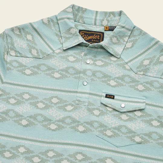 Blue polo shirt with darker blue and cream triable print all over