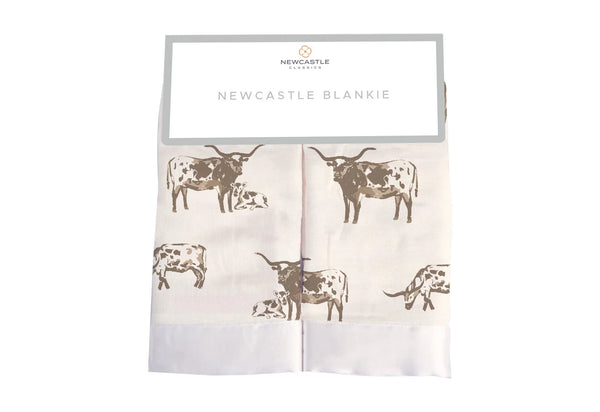 Two identical blankies in texas longhorn print all over