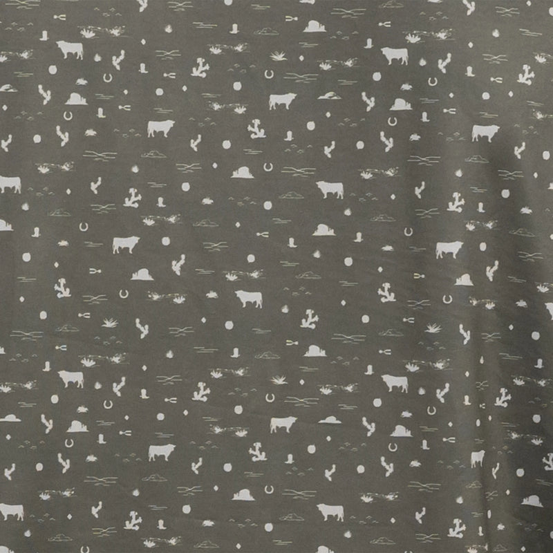 Dark green fabric with white cow pattern