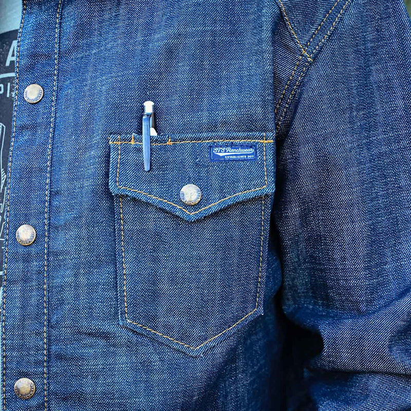 Heavy duty denim, lightly lined shirt jacket with double breast pockets and button front