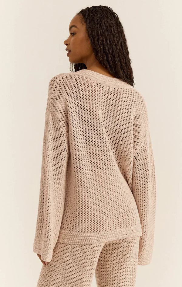 Crochet sweater with dramatic v neck in a beige color