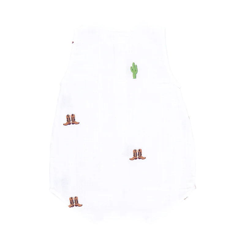 Baby jumper in white with embroidered cowboy boots and cacti all over