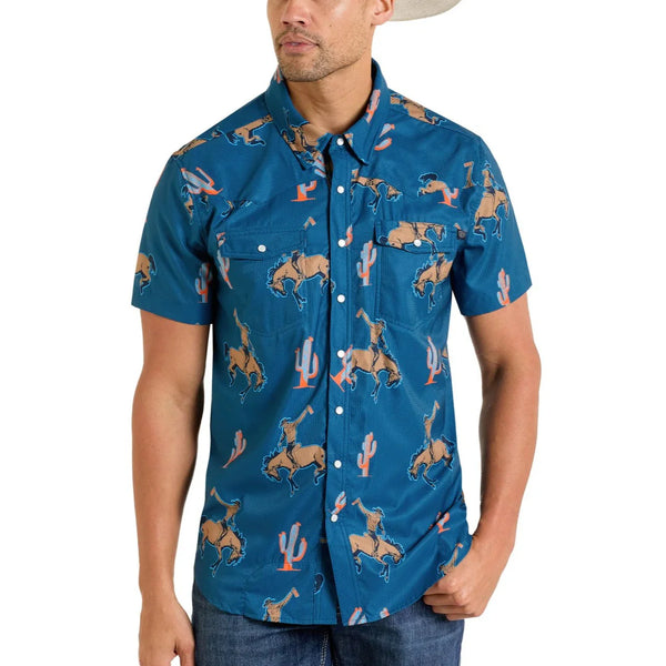 Man wearing a blue patterned shirt with a white background