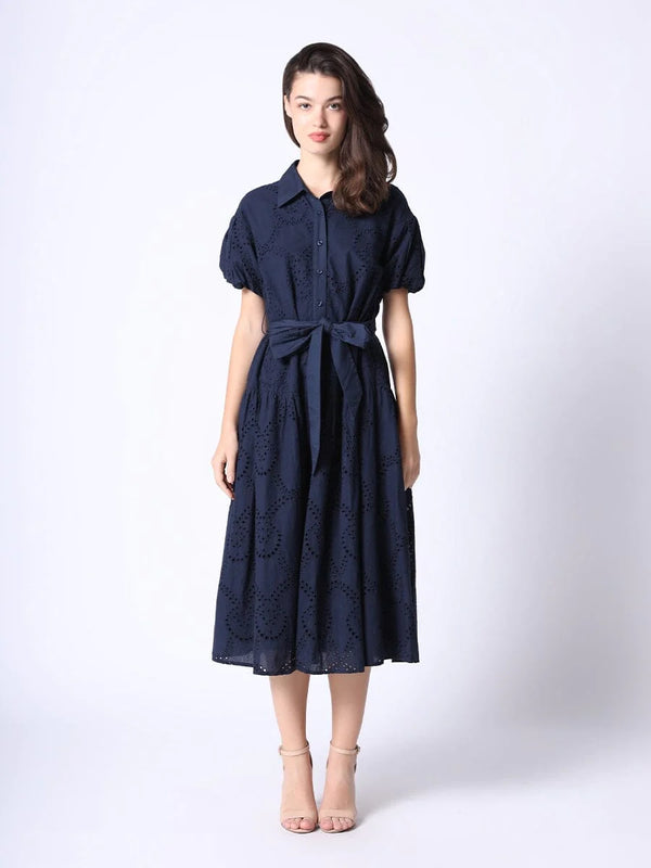 Navy eyelet embroidery dress with button front and matching belt and short sleeve puffy sleeves