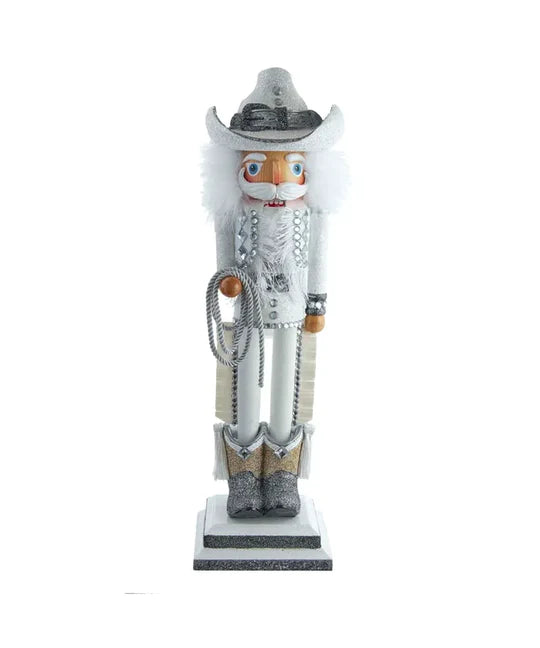 COWBOY NUTCRACKER WITH LASSO IN HAND, COWBOY HAT ON HEAD AND WHITE RHINESTONE EMBELLISHMENTS THOUGHOUT